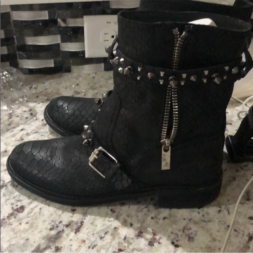 Sam Edelman booties in black with snakeskin print .